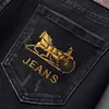 Mäns jeans designer europeiska broderade jeans mäns svarta höst och vinter tjocka smala smala fitt byxor high-end elastiska live 2lz1