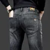 Designer de jeans pour hommes Concentrez-vous sur les jeans gris foncé haut de gamme de grande marque, les pantalons jeunes ajustés élastiques pour hommes, les produits épais WSG2 GSZU