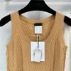 2023 Summer Women's Knits Vest Tee Diseñador Crop Tops con cuentas de letras Camisas Runway Designer Marca de gama alta Elasticidad Cachemira elástica Camisetas sin mangas Outwear