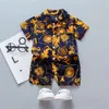 Kläderuppsättningar 0-5y barn baby pojke kläder boho sommar blommor tryck set 2 st kort ärm t-shirtshorts barn pojke strand slitage kläder 12 styles 230627