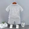 Pur coton coréen enfants vêtements garçons ensemble 2023 nouveaux polos à manches courtes pour les enfants de petite et moyenne taille tendance de la mode estivale