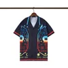 Saison Hommes Femmes Chemises décontractées Été Hawaii Style Bouton Revers Cardigan À Manches Courtes Chemise Surdimensionnée Blouses Tops Marque Designer 1911