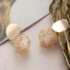 Online Customization Holographic Geometric Shape Iron Wire Hollow Ball Earrings Studs Wholesale Travel Jewelry