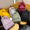 Bags Hocodo Solid Canvas Backpack for Teenagers Women Casual Large Capacity School Bag Simple College Wind Travel Backpack Mochila