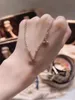 Designer de luxe plaqué or 18 carats collier pendentif chaîne de perles pour hommes et femmes bijoux à la mode accessoires de mode cadeaux ne ternissent jamais