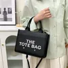 Bolso de bandolera de vanidad de paja para mujer Bolsos de tocador de hombro de rafia para hombre Bolsos de diseñador al por mayor Bolsos de playa marc the tote bags bolso de viaje de embrague de tejido de lujo clásico