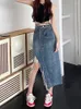 Kjolar kjol kvinnor våren faldas mujer modekläder koreansk delad tofs casual a-line denim vintage rippade jean lång