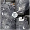 Męskie dżinsy Summer Capris Korean prosta rurka Złamany otwór retro dżinsowe spodnie modne szorty cienkie styl 5 punktów 230629