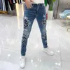 Jeans da uomo firmati primavera ed estate piedi sottili pantaloni casual di marca di moda slim fit stampa elastica lunga QGLT
