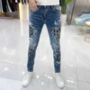 Jeans masculino designer primavera e verão pés finos ajuste fino moda marca calças casuais estampa elástica longa QGLT