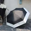 Простой стиль Хепберн Черно-белый двухцветный пэчворк Персонализированный зонтик от солнца Виниловый солнцезащитный складной зонт Большой зонт