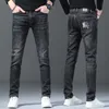 Jeans pour hommes designer 2022 Automne/Hiver New Wear Slim Fit Small Straight Mid Rise Marque M2RE