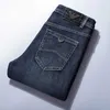 Męski projektant dżinsów 2022 Wiosna nowa marka męskiej dżinsowe spodnie luźne proste lampę rozrywkę elastyczna młodzieżowa środkowa talia 17S7