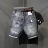 Męskie dżinsy Summer Capris Korean prosta rurka Złamany otwór retro dżinsowe spodnie modne szorty cienkie styl 5 punktów 230629