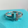 Varumärkescharm 925 Sterling Silver Tff Turquoise Set With Diamond Coil Ring Female Niche Design Lätt lyxig high-end Feeling Mother of Pearl Shell