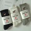 Photos de vraies chaussettes pour hommes femmes blancs noir 23ss de mode