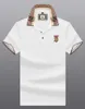 2023 Designer Men's Luxury Polo T-Shirt Camisa Pólo Masculina de Verão Premium Bordado Solto Tamanho Grande Manga Empresarial Lapela T-Shirt Masculina Cor Sólida Tamanho M-4XL