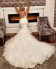 2023 Sexy Mermaid Wedding Dresses One Shoulder Sleeveless Lace Crystal Beads Feather Illusion Ruffles Tiered Bridal Gowns Church Bride Wedding Dress