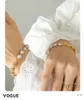 Luxurys Designers bracelet Women Charm braclet en or bracelet Tendance mode boutique cadeau bijoux Womens Brass bracelet or torque bangle Double rangée Perles de luxe