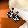 Studörhängen koreanska geometriska engelska brev feminint temperament länge enkelt överdriven stift