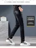 メンズジーンズデザイナー秋のニューブラック刺繍ジーンズの男子スリムパンツが小さな足と穴がトレンドトレンド韓国のトレンディカジュアルi1tr