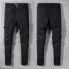 Schwarze zerrissene Jeans Miri Jeans Herren Designer Knie Skinny Straight Größe 28-40 Motorrad Trendy Long Hole High Street Denim Bin gestapelt