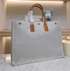 Sacola de praia Rive Gauche de grife Bolsa feminina de lona e tecido de couro de grande capacidade Bolsa de compras de luxo Bolsa de compras de linho superior Carteira de viagem 103837