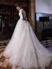 Скромные арабские мусульманские белые свадебные платья с высоким вырезом и длинными рукавами A Line Свадебные платья из тюля Верхние кружевные аппликации Элегантная одежда для невесты Sweep Train 2023