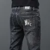 Designer de jeans masculino 2022 outono/inverno novo estilo slim fit pequeno reto cintura média marca M2RE