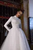Skromne arabskie muzułmańskie białe sukienki ślubne Wysokie szyi długie rękawy Linia Tiulowe suknie ślubne górne koronkowe aplikacje Elegancka oblubienica zużycie pociągu 2023