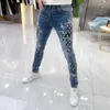 Jeans da uomo firmati primavera ed estate piedi sottili pantaloni casual di marca di moda slim fit stampa elastica lunga QGLT