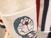 Tshirts Doraemon Cartoon Girl Kurtka Sweater Women Fall 2023 luźne i leniwe styl Vneck dzianin mody 230628