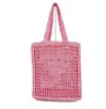 Designer di marca Straw Summer Borsa da spiaggia intrecciata per uomo e donna Borsa scavata Borsa a mano Borsa a tracolla Borsa da viaggio Borsa a tracolla