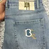 Designer di jeans da uomo Pantaloncini di jeans da uomo Pantaloni a gamba dritta Burb Ricamo Pantaloni casual Lavato Moda Cerniera Controllo dell'accesso Pantaloni della tuta di jeans 9ROO