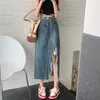 Kjolar kjol kvinnor våren faldas mujer modekläder koreansk delad tofs casual a-line denim vintage rippade jean lång