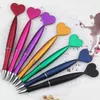 2pcs 0.5mm Penna a sfera rotante Kawaii Love Heart Decoration Neutral Cute School Student Forniture per la scrittura Regalo