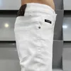 Designer de jeans pour hommes Xintang Nouveaux produits européens Printemps et été Pieds minces Pantalons décontractés élastiques Tendance MFUF