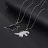 Kettingen zwart-wit dubbelzijdig druppelolie dinosaurus hiphop ketting zonder vervaging schattig dier trui ketting paar accessoires