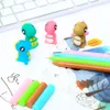 Stylos 20pcs cool fantaisie stylos kawai mignon dinosaur gel stylo blue kawaii papernetery stand to school approvisionnement du bureau accessoire