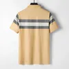 2023 Mens Stylist Polo Shirts Luxury Men's Polos Designer Clothing Kort ärmar Fashion Summer T-shirts Cell Standed Casual Tees Tops Shirt Leisure Top Khaki M-3XL