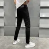 Designer de jeans pour hommes Xintang Nouveaux produits européens Printemps et été Pieds minces Pantalons décontractés élastiques Tendance MFUF