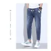 Jeans uomo primavera estate nero blu cargo uomo streetwear denim pantaloni jogger pantaloni larghi harem pantaloni uomo 4XL 5XL 230629