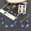 Orecchini a bottone Collana di fiori di vetro blu Bracciale Bracciale in argento Set di gioielli di temperamento di moda Accessori per abiti da banchetto da donna