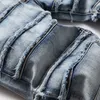 Jeans strappati da uomo High Street Pantaloni alla moda con cuciture slim fit autunnali Pantaloni in denim di cotone Rock Explosion