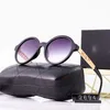 50% Rabatt auf Großhandel der Sonnenbrille Neue runde kleine duftende große Rahmen weibliche Mode -Katze Augen Sonnenbrille gerade