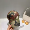 Дизайнеры бейсбольных кепок Ведро Шляпа Камуфляжный узор Письмо Snapback Роскошные шляпы дальнобойщика Женщины Мужчины Уличные кепки Классическая мода Солнцезащитные спортивные кепки Наружная установка