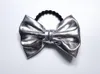 Akcesoria do włosów 12pcs moda 4 "błyszczące skórzane krawaty brokatte bowkont elastyczne opaski księżniczki dziewczęta