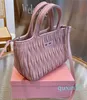 Dulce y personalizado coche costura divisor patrón bolso lindo rosa blanco negro mini cubo bolsos de moda de mujer bolso de cuero suave