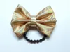 Akcesoria do włosów 12pcs moda 4 "błyszczące skórzane krawaty brokatte bowkont elastyczne opaski księżniczki dziewczęta