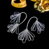 Charm Rainie Yang's Same Exaggerated Personality Metal Romantic Su Song Needle Earrings Women's Niche Senior Design Silver 230630